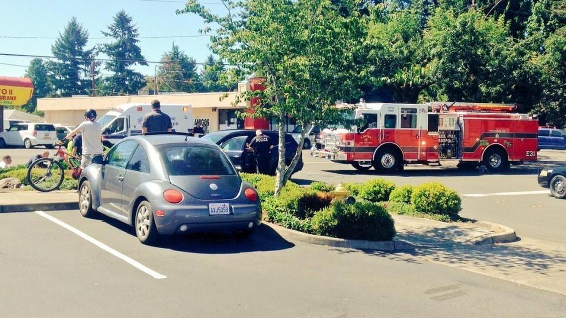 A couple on a tandem bike in Lacey were injured Tuesday after a vehicle apparently hit them on eastbound Lacey Boulevard Southeast.