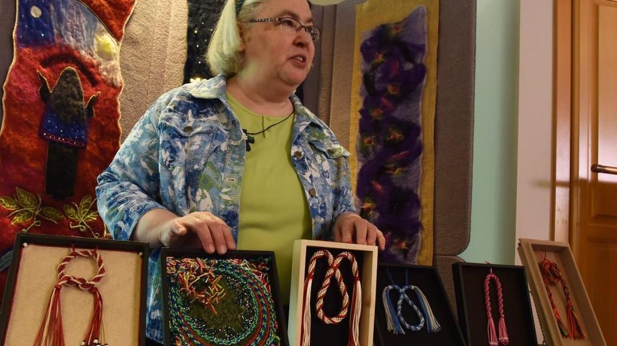Sister Monika Ellis talks about her various hand-crafted pieces of Kumihimo, an ancient form of Japanese braiding that will be on display at the the annual Art Show and Book Sale this weekend at the St. Placid Priory in Lacey.