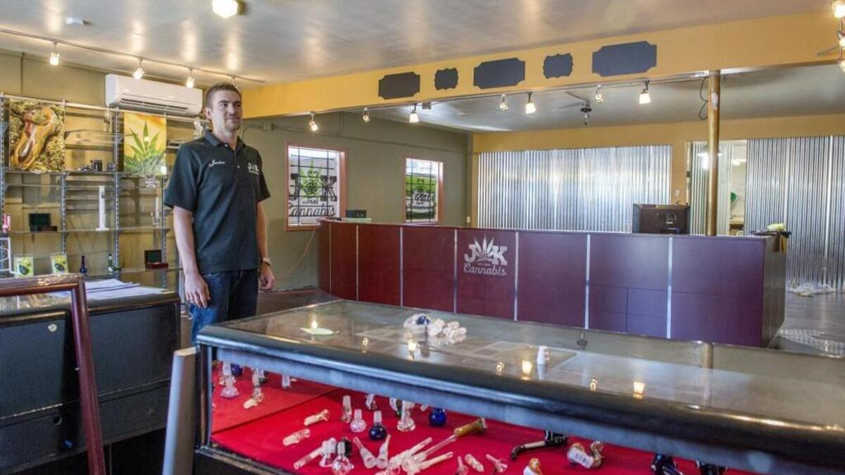 In June 2015, Jordan Michelson stands in the storefront on Pacific Highway SW, in which he hoped to open J and K Cannabis, a recreational marijuana store. The City of Lakewood ultimately denied him and two other pot entrepreneurs necessary licenses because they couldn’t prove marijuana was legal under federal law.