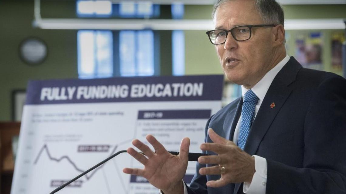 Gov. Jay Inslee speaks at a press conference about his plan to fully fund public schools on Dec. 13 at Lincoln High School in Tacoma.