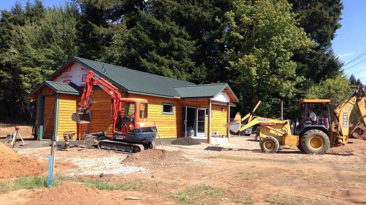 
Construction crews work Friday, Sept. 11, 2015, at a site on the Squaxin Island Tribe’s reservation that could become a retail marijuana store.
