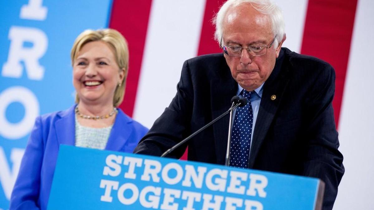 Sen. Bernie Sanders, I-Vt., accompanied by Democratic presidential candidate Hillary Clinton, speaks during a rally in Portsmouth, N.H., Tuesday, July 12, 2016, where Sanders endorsed Clinton for president.