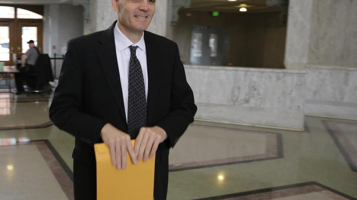 
State Auditor Troy Kelley arrives at the federal courthouse in Tacoma for a hearing May 11. Kelley is currently on unpaid leave from his state job.
