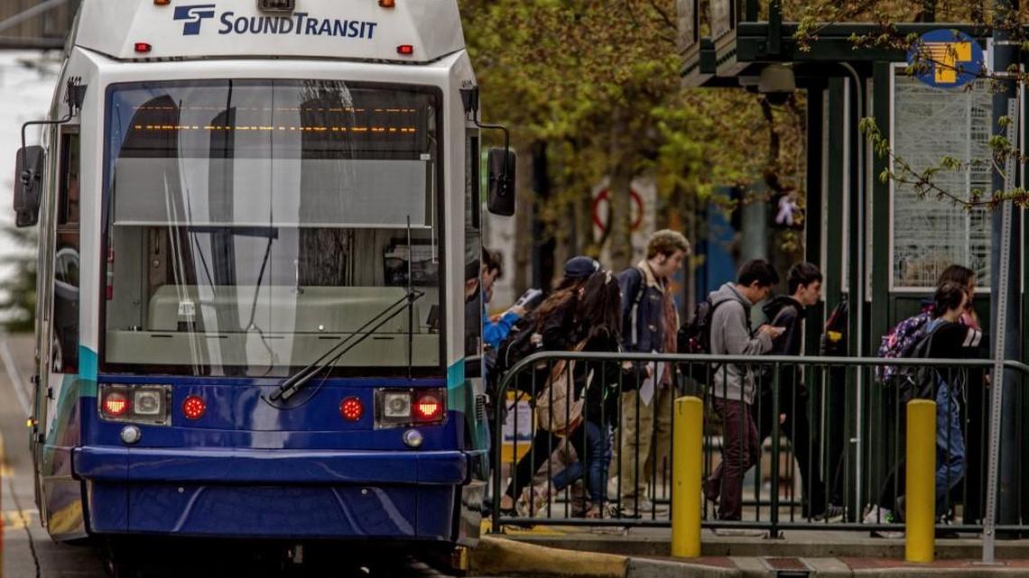Commuters step off a Link light rail train at the Commerce Station in Tacoma, Washington, Tuesday April 12, 2016. With Sound Transit 3, voters in King and Snohomish counties approved about $54 billion over the next 25 years to expand light rail, commuter train and express-bus services across the Puget Sound region. Some state lawmakers are now trying to ease the burden of the taxes included in the transit package, which voters in Pierce County rejected.