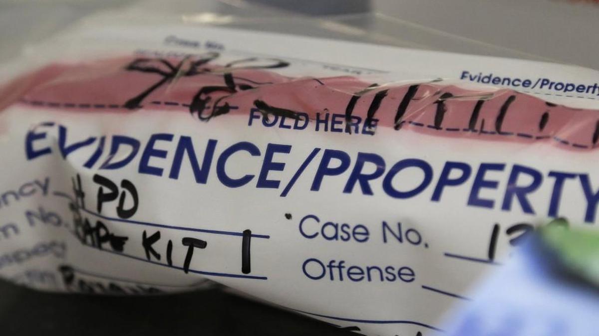 An evidence bag from a sexual assault case is examined in the biology lab at the Houston Forensic Science Center in Houston. In 2015, Legislators in more than 20 states were considering — and in some cases, passing — laws that include auditing all kits and deadlines for submitting and processing DNA evidence.
