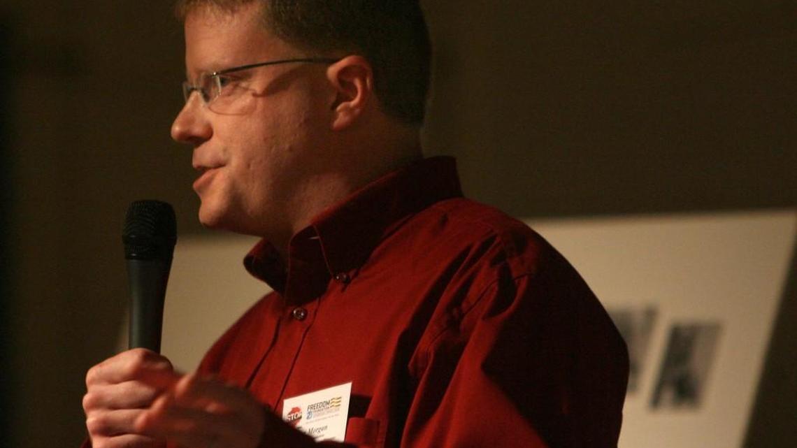 FILE PHOTO: STOP Thurston County organizer Glen Morgan speaks to a crowd at Rochester’s Swede Hall in 2011. Morgan is leading two political action committees that have sponsored robocalls this election season targeting Thurston County Commission candidate Jim Cooper. Morgan reported receiving a death threat on Monday shortly after one of the robocalls went out to local homes.
