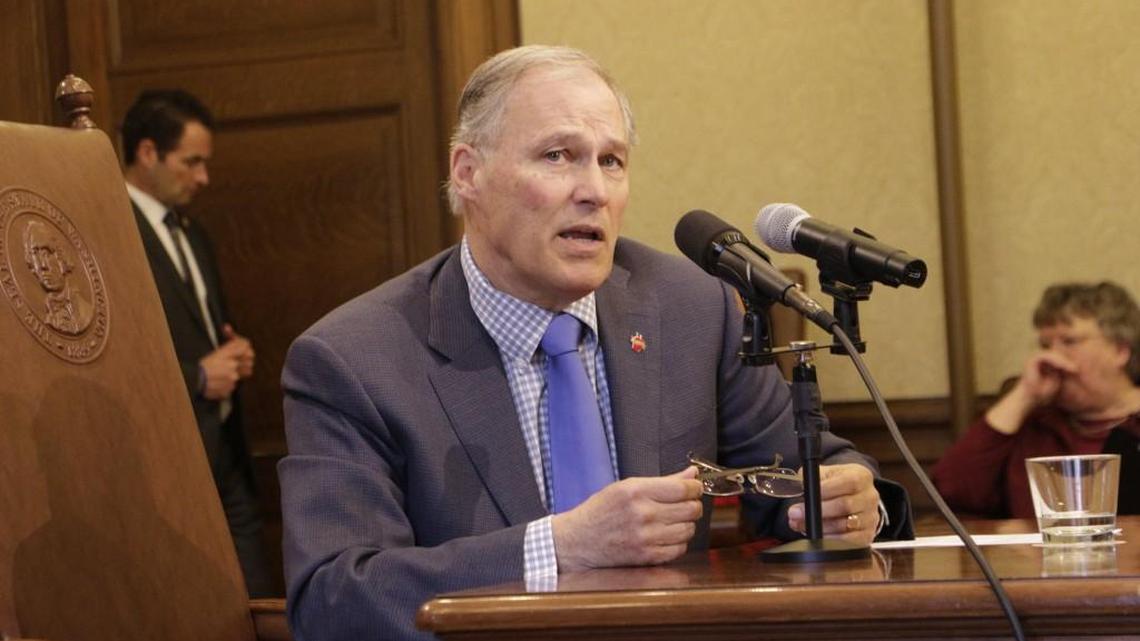 Gov. Jay Inslee speaks to reporters after signing a bill that alters the contracting structure of home health care workers, on Tuesday, March 27, 2018, in Olympia, Wash. Supporters of the measure says it streamlines management services of health care workers, but opponents who had asked Inslee to veto it argued it was meant to let a powerful union skirt a court ruling that pertained to union membership. (AP Photo/Rachel La Corte)