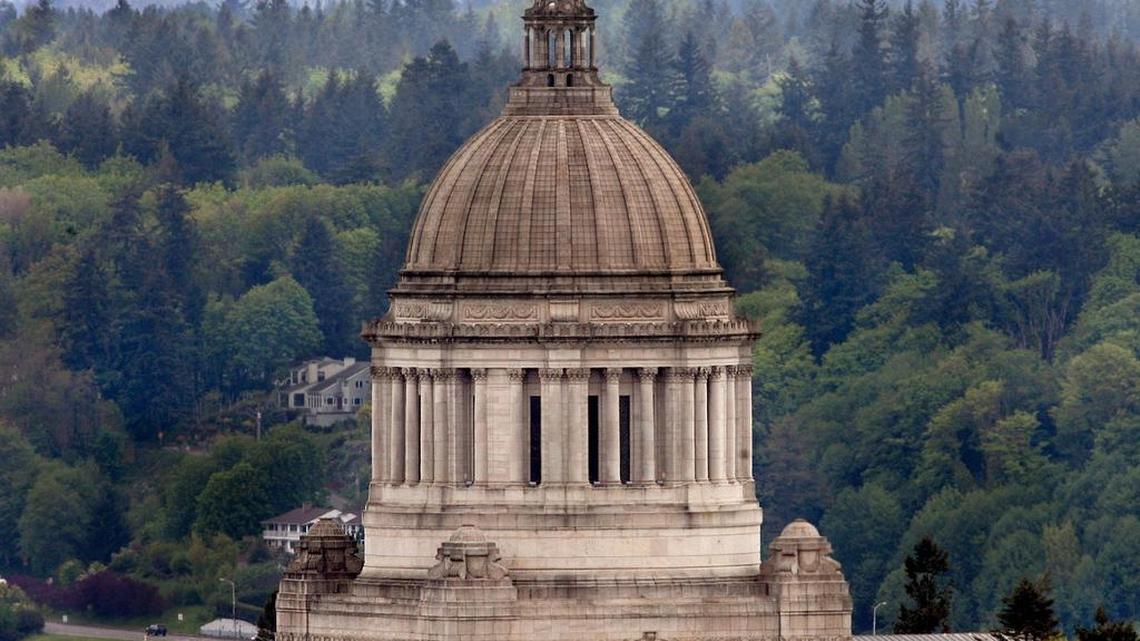 The state Legislative Building in Olympia. Both houses have proposed budgets, but neither includes a carbon tax.