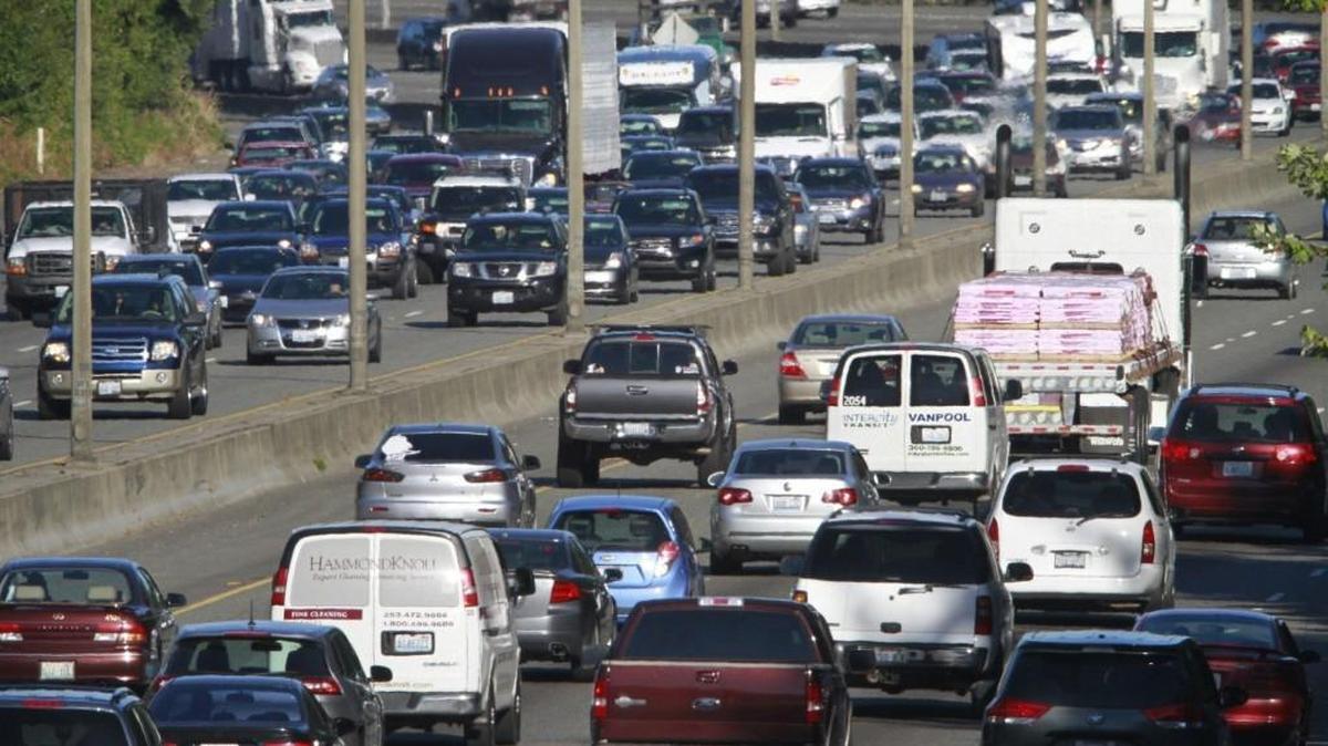 Friday evening rush-hour traffic backs up last month on Interstate 5 through Olympia.