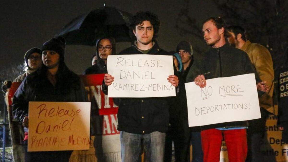 Protestors gather outside of the Northwest Detention Center in Tacoma, Wash., on Tuesday, February 14, 2017. Protestors gathered to protest the detainment of Daniel Ramirez-Medina. Ramirez who fell under former President Barack Obama's Deferred Action for Childhood Arrivals (DACA) program, was detained by authorities in Seattle.