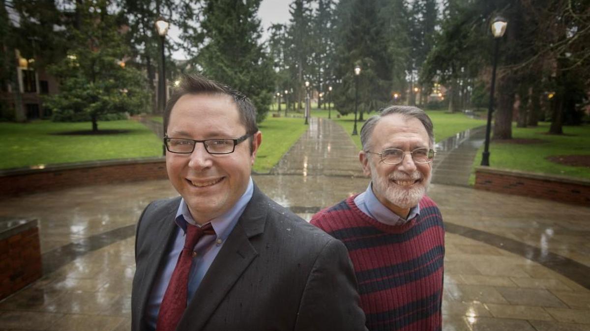 Political scientist Michael Artime, left, and presidential historian Mike Purdy are leading a lecture series at the University of Puget Sound about the politics of the 2016 presidential race and how it differs from past elections. The two men are photographed in front of the university’s Collins Memorial Library on Wednesday.