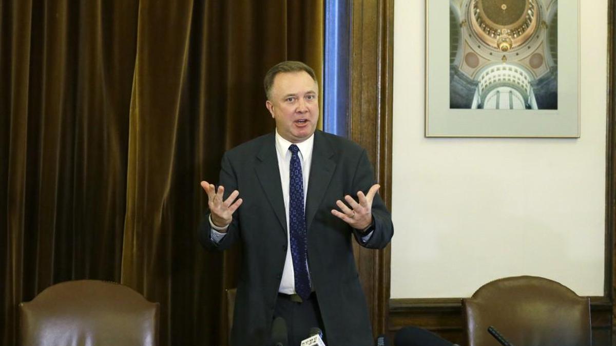 Sen. Doug Ericksen, R-Ferndale, talks to reporters Thursday at the Capitol in Olympia. Ericksen, who is serving as a state senator and a member of President Donald Trump’s transition team, said the GOP majority in the state Senate can rely on him, and that he’s able to do both jobs.