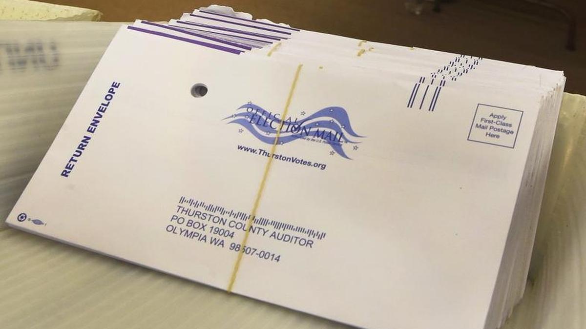 A stack of ballots wait to be opened in 2016.