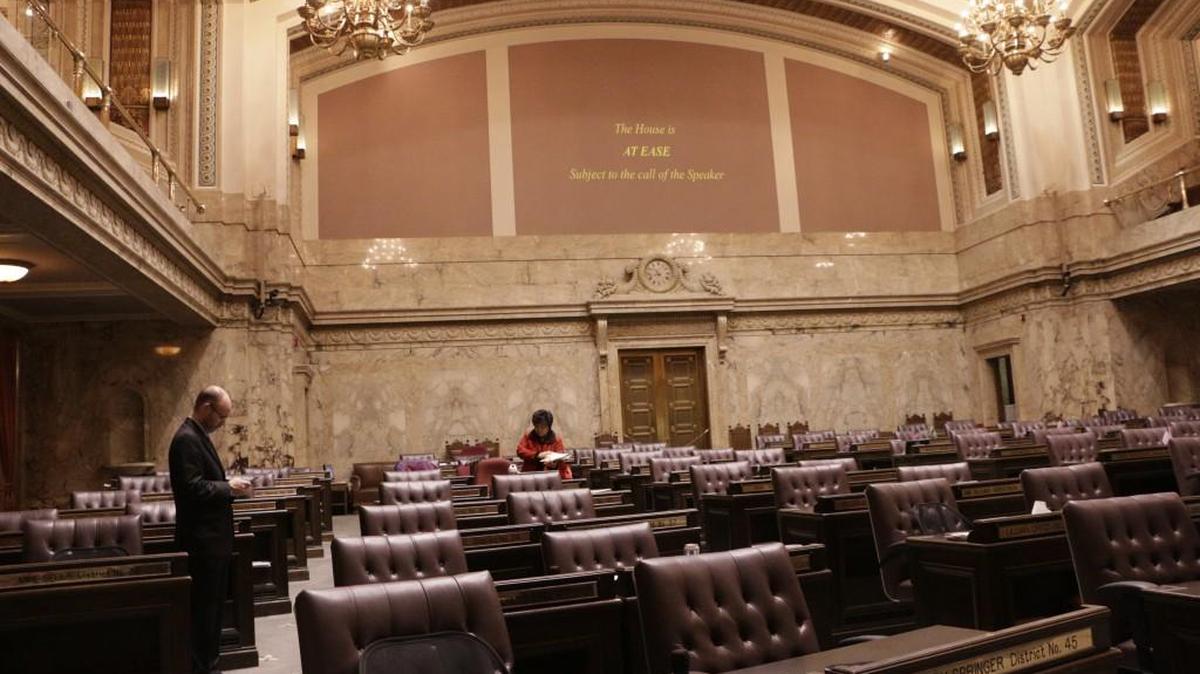 The House chamber is seen mostly empty just before lawmakers officially adjourn a special legislative session March 29 in Olympia. Lawmakers prepared to conclude the 20-day overtime session after completing their work on a supplemental budget.