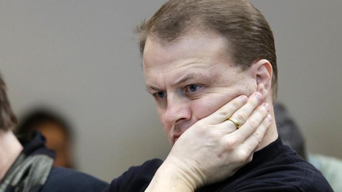 Initiative promoter Tim Eyman waits for his turn to speak before the Senate Ways and Means Committee, Monday, Feb. 9, 2015, at the Capitol in Olympia, Wash. The committee was debating whether ballots should include statements addressing the potential cost of initiatives being considered by voters if spending would increase or decrease by more than $25 million over two years. Eyman opposed the measure.