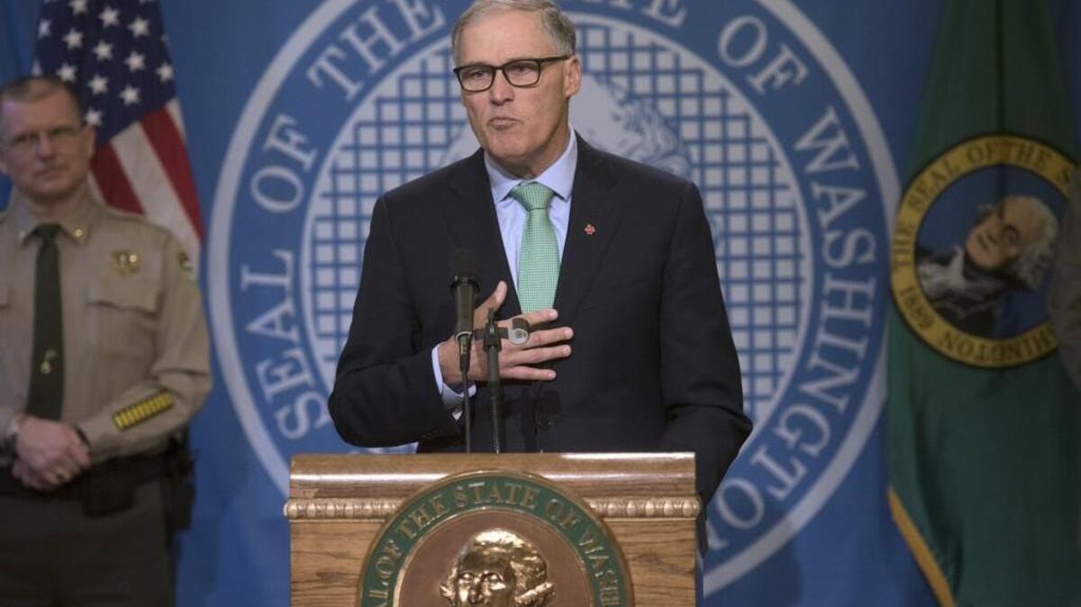 Gov. Jay Inslee talks about his 2017-2019 budget proposal in the Governor's Conference Room at the Capitol in Olympia on Wednesday, Dec. 14, 2016.