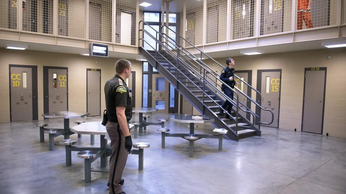 Sheriff’s deputies make rounds through the maximum security unit at the Thurston County jail in Tumwater in 2019.