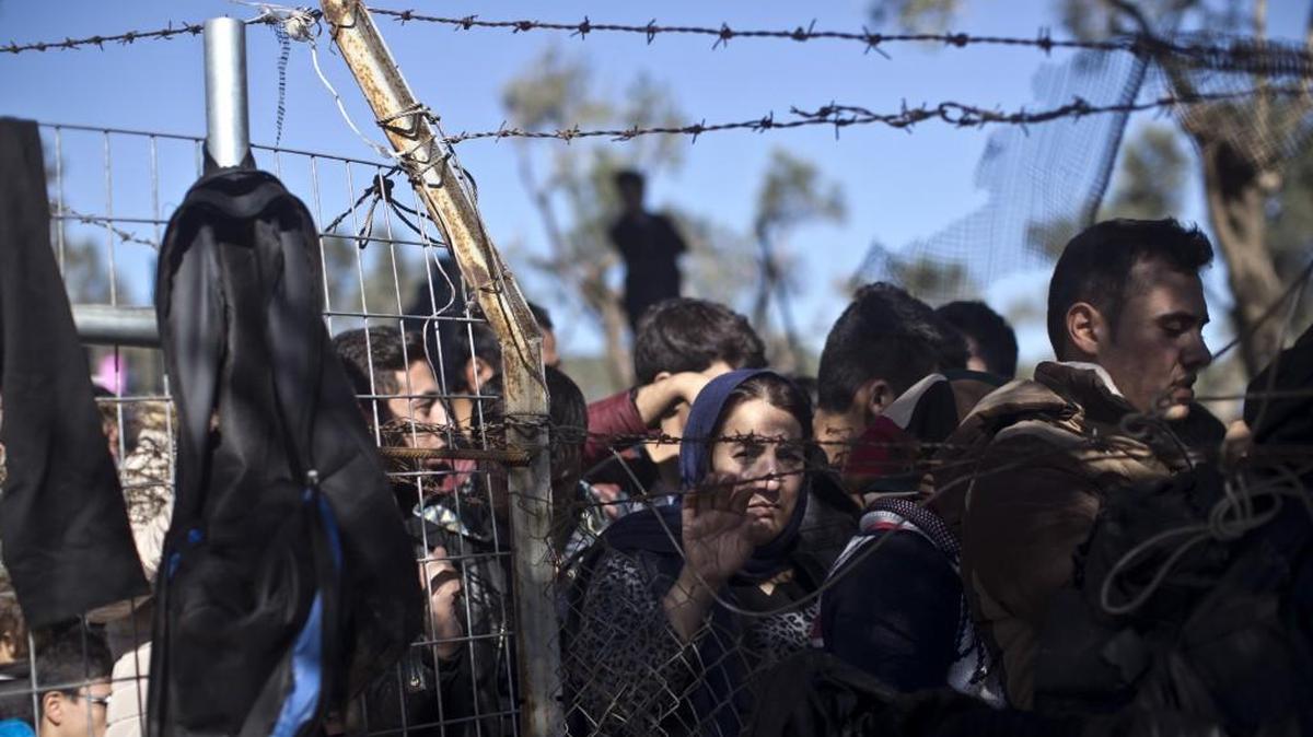 FILE - In this Nov. 4, 2015, file photo, people wait in line to enter the migrant and refugee registration camp in Moria, on the island of Lesbos, Greece. Some Republicans are pushing back against aggressive opposition in their party to Syrian refugees resettling in the U.S., fresh evidence of a rift within the GOP that threatens to complicate the party’s outreach to minorities heading into the 2016 presidential contest.