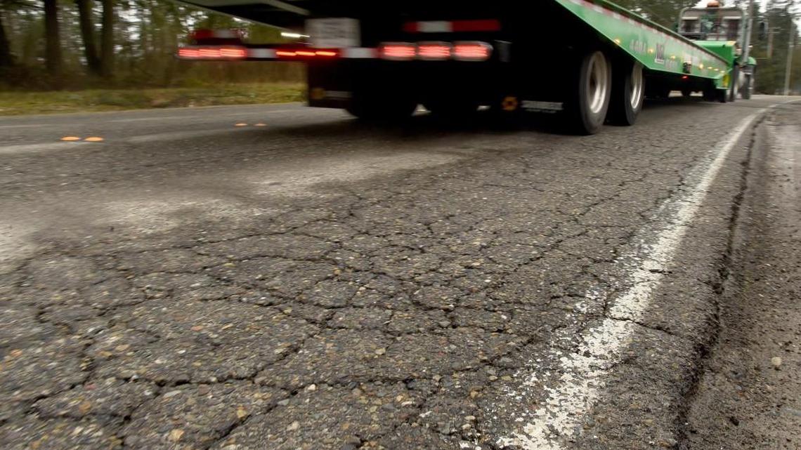 With the daily pounding from heavy commercial traffic, Hogum Bay Road Northeast is one arterial the city of Lacey has designated as needing repair.