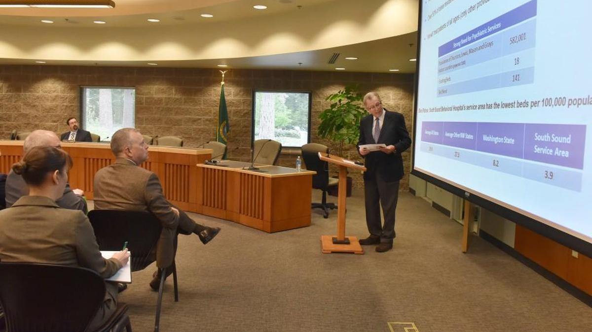 Dr. Richard Kresch outlines his company's proposal during before the City of Lacey Hearings Examiner regarding the health hospital proposed by US HealthVest at currently vacant 605 Woodland Square Building.