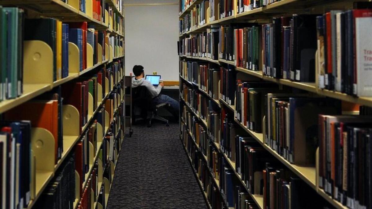 Judge rules on city income tax for college