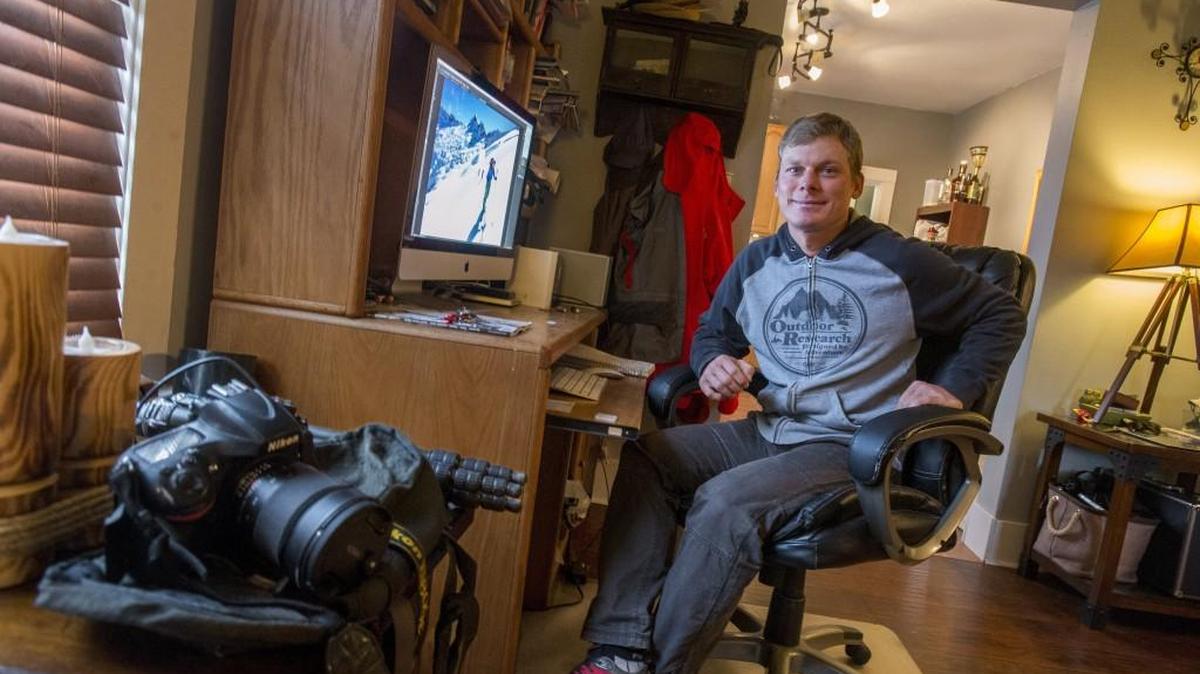 Jason Hummel in his home in Tacoma. The former financial planner now makes his living as a backcountry ski photographer.