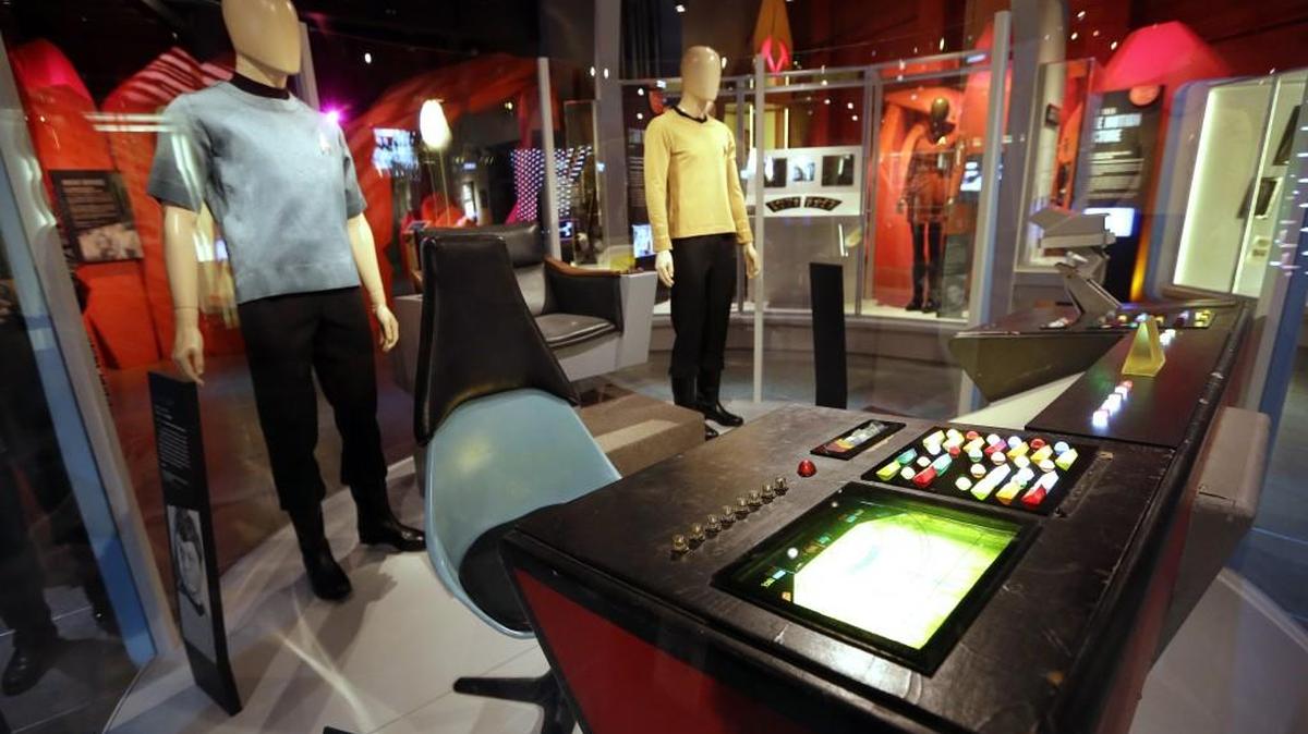 Costumes and pieces of the set of the “Star Trek” TV series are displayed in the exhibit “Star Trek: Exploring New Worlds” at the Museum of Pop Culture in Seattle.