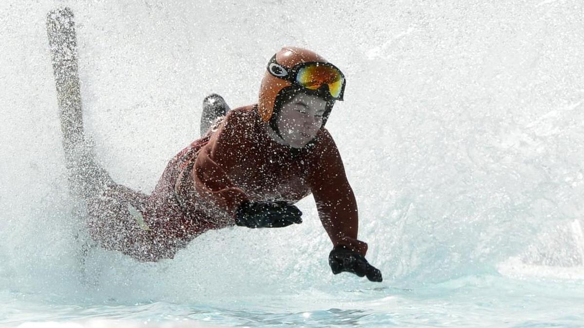 Pond skimming and wipeouts are a spring skiing tradition.