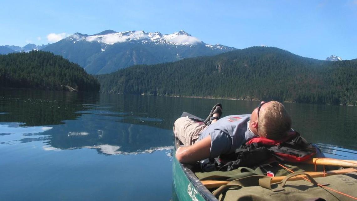 Brian Devereux of Milton takes a break near the end of his 60-mile paddle on Ross Lake, a resevoir in the North Cascades.