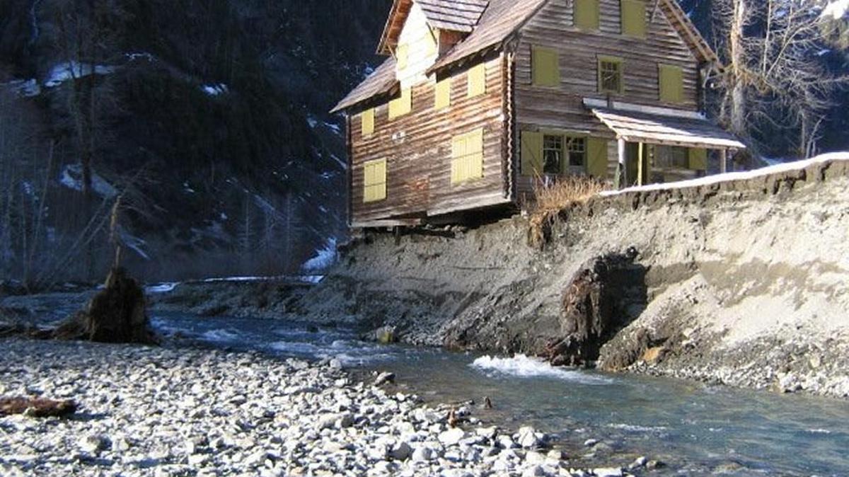 The East Fork Quinault River had undercut the Enchanted Valley Chalet inside Olympic National Park in May 2014.