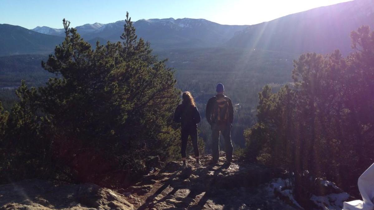 Hikers take in the view from atop Little Si near North Bend.