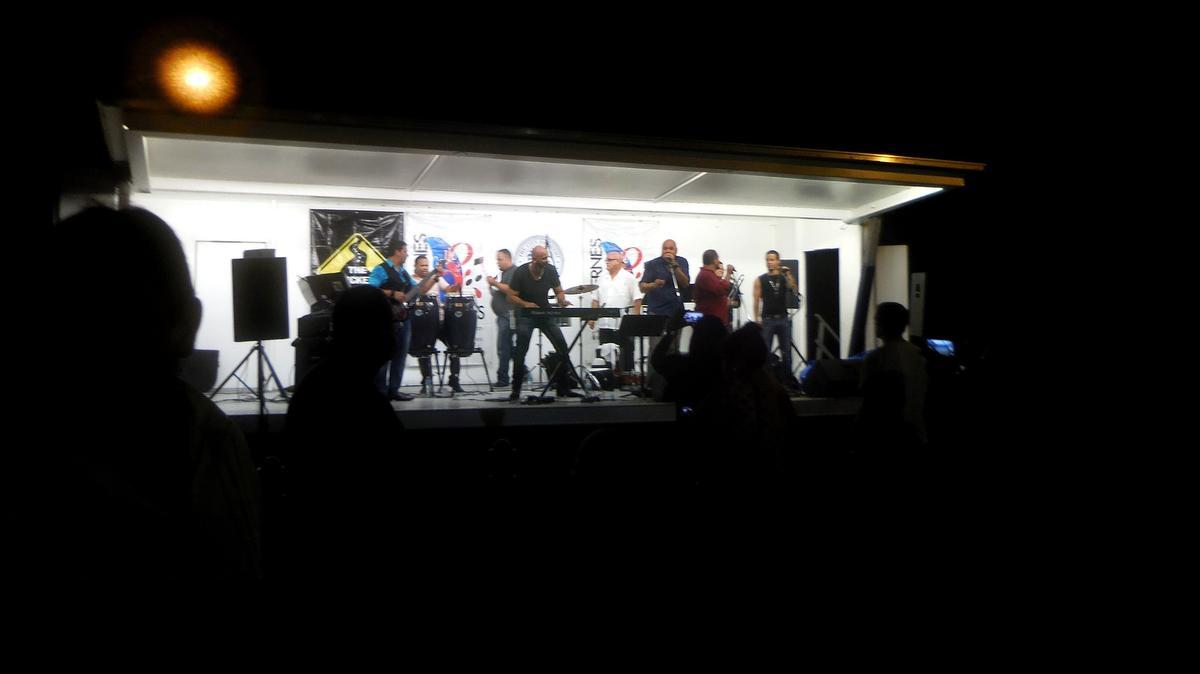 
Marlow Rosado Y la Riquena, a top-flight, Miami salsa band, stokes the crowd at Viernes Culturales — a monthly Cuban-American arts/music event in Miami's Little Havana. The band also appears across Calle Ocho at the Ball & Chain.
