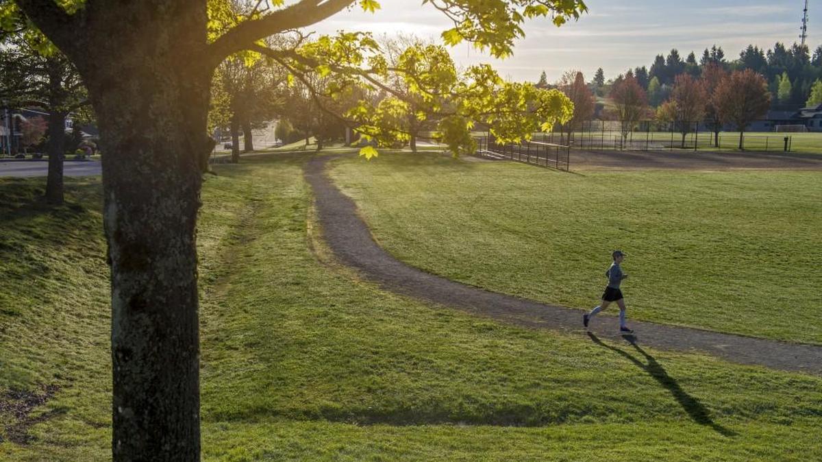 Donna Jackson runs through Vassault Park last week. The 65-year-old will compete in the Boston Marathon on April 18.