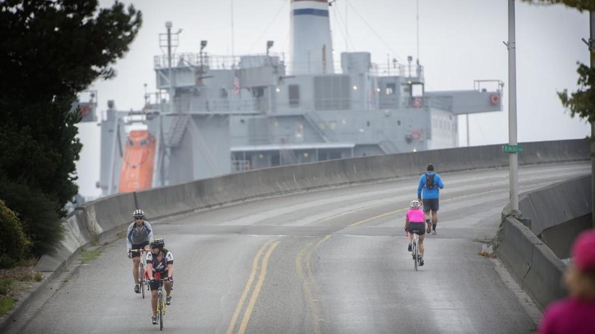 
Bicycle riders take advantage of Ruston Way being closed to cars as they head toward Tacoma during the 2014 Downtown to Defiance. This year’s event is Sept. 13. 

