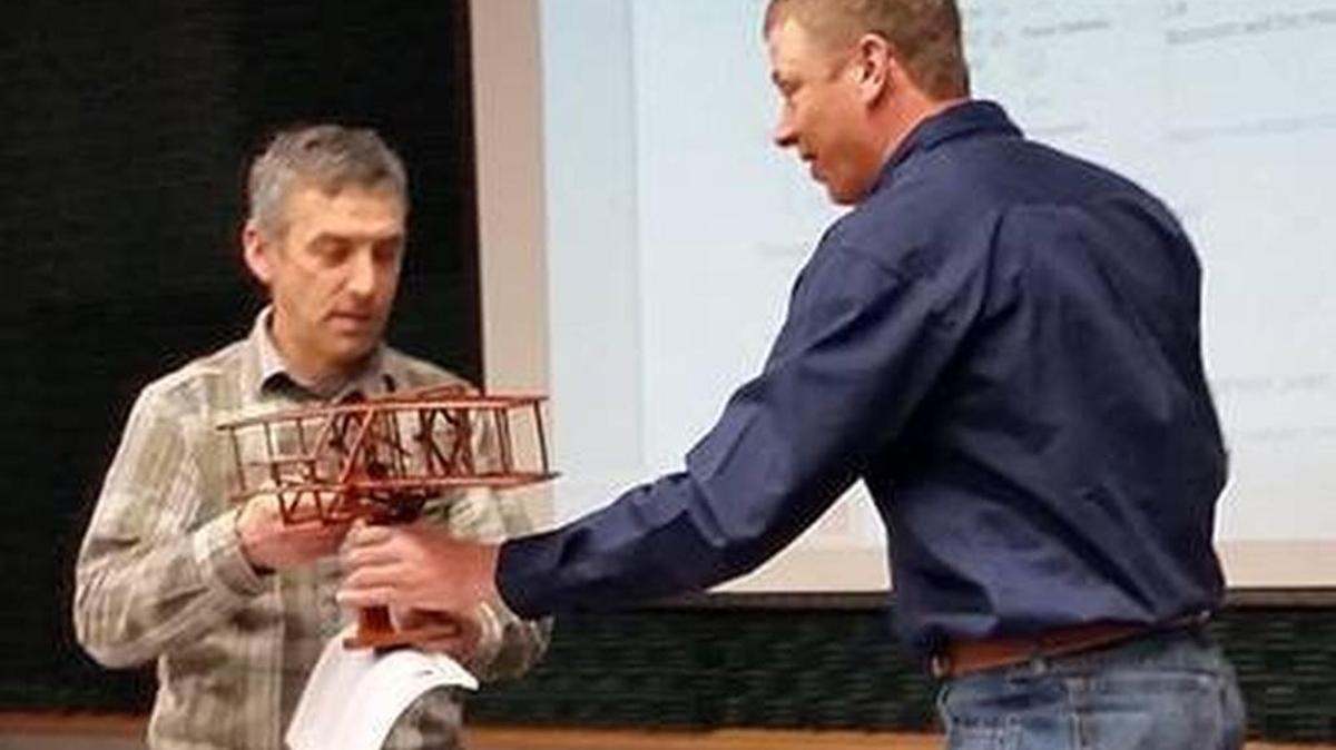 
Mount Rainier National Park aviation manager Glenn Kessler, left, receives the National Park Service Wright Brothers Aviation Safety Award from Pacific West regional aviation manager Shad Sitz.

