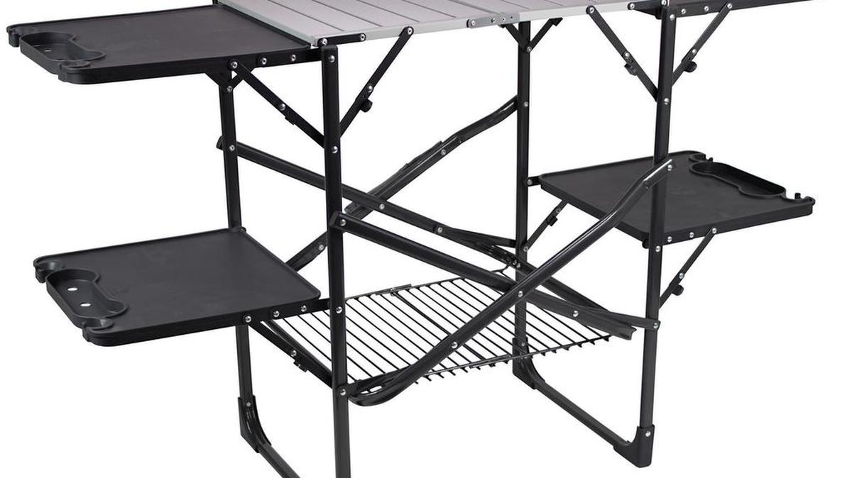 
GCI Outdoor’s Slim-Fold Cook Station includes a heat-resistant aluminum countertop, lower rack for storage and four fold-out side tables with built-in beverage, wine glass, garbage bag, paper towel and utensil holders.
