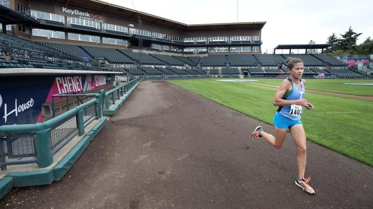 With no other runners in sight as she runs the warning track of Cheney Stadium, Kate Landau of Tacoma, went on to capture the Tacoma Narrows Half Marathon in August.