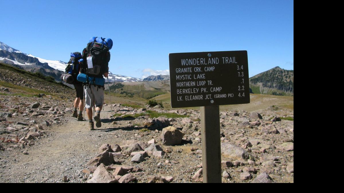 
A trail sign on the north side of the mountain indicates the remaining distance — 3.4 miles — to Granite Creek Camp, the first campsite of the 93-mile trip along the Wonderland Trail in Mount Rainier National Park.
