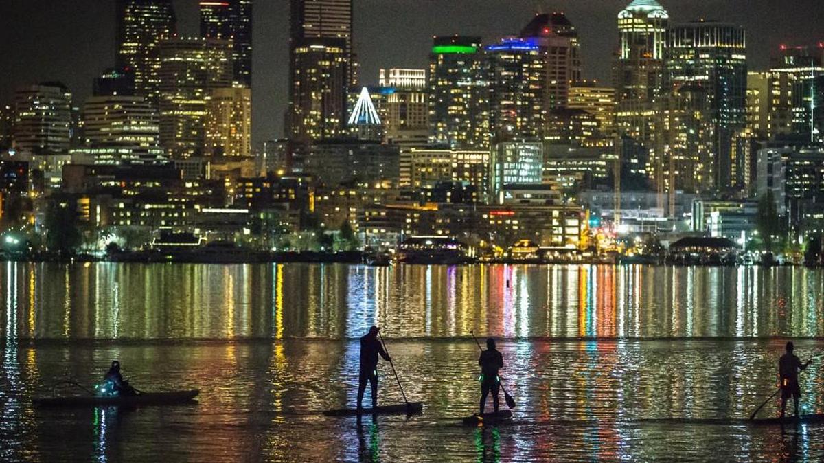 A six-person team of stand-up paddleboarders raised money for families dealing with cancer through a 24-hour paddling event.