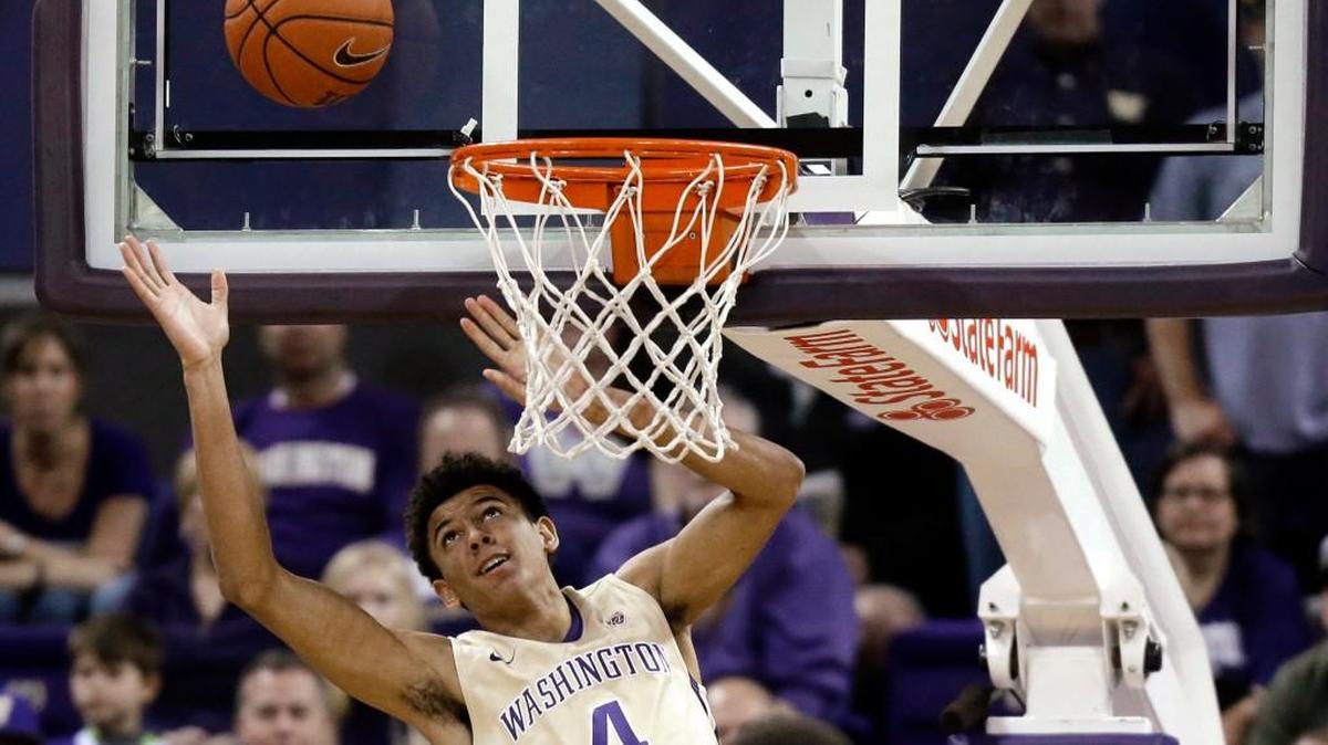 Washington forward Matisse Thybulle watches a missed alley-oop attempt Saturday during the first half against Stanford.