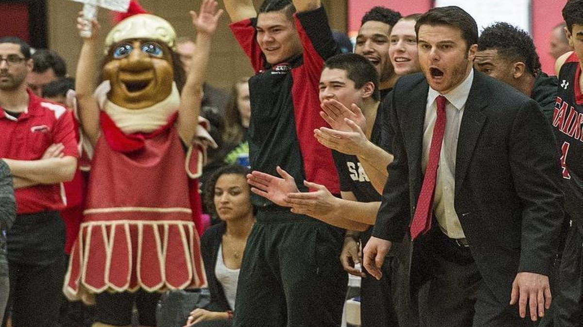 Saint Martin’s coach Alex Pribble (right) is entering his third season with the Saints. He has signed seven recruits to his 2017 class.