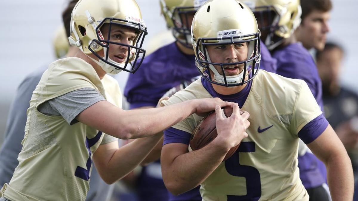 
True freshman Jake Browning, left, and redshirt junior Jeff Lindquist are two of the three quarterbacks competing for the starting job for the Washington Huskies.
