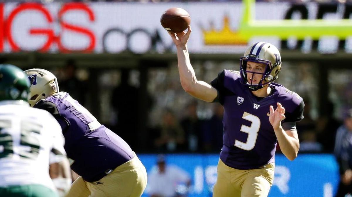 
Washington quarterback Jake Browning throws against Sacramento State in the first half Saturday in Seattle. Browning threw for 326 yards. 
