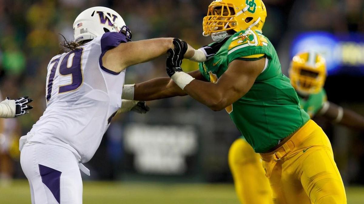 
Coleman Shelton, left, has started at three of the five positions on the offensive line for the Washington Huskies.
