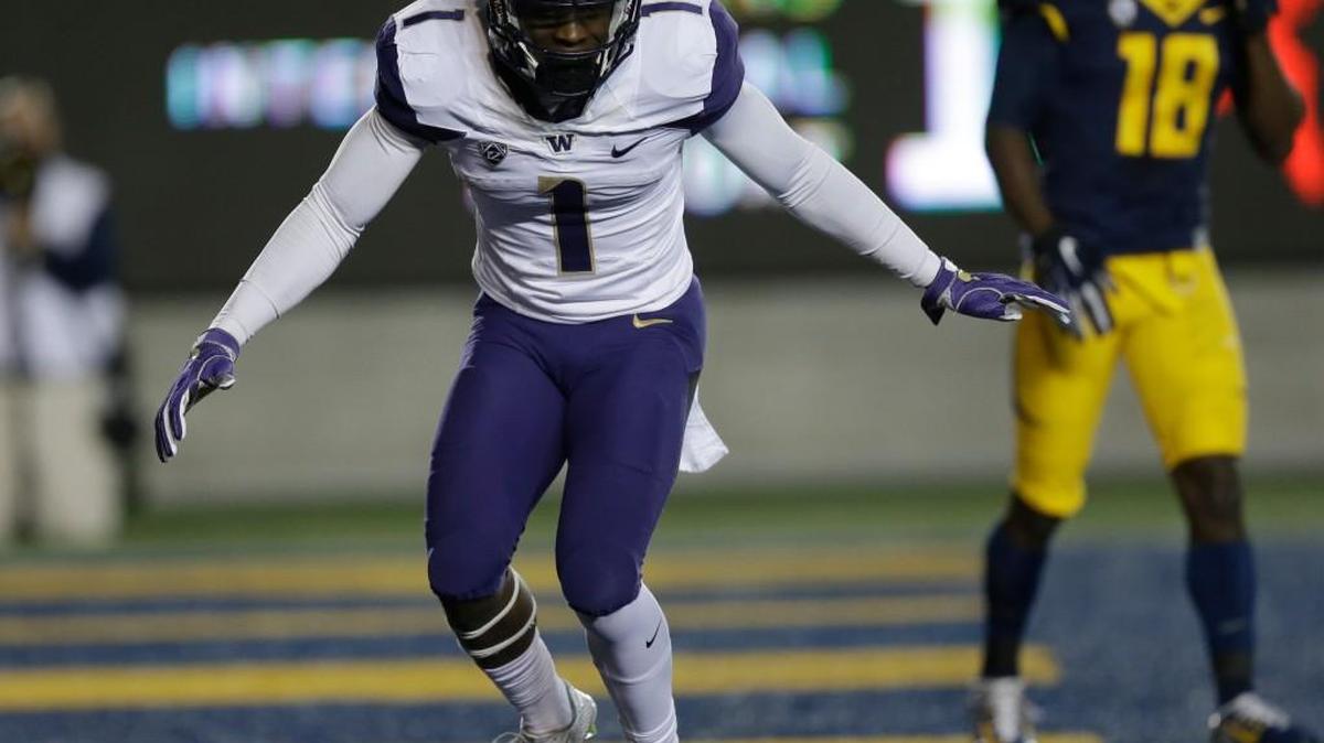 Washington's John Ross (1) celebrates after scoring a touchdown against California during the first quarter.