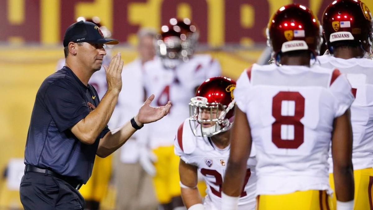 
Current USC coach Steve Sarkisian, left, is facing his former team — Washington — for the first time since he left UW in 2013 when the Huskies meet the 17th-ranked Trojans on Thursday in Los Angeles.
