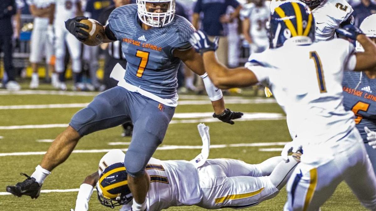 Brandon Wellington of the Eastside Catholic Crusaders looks for room to run in the first half of the AAA state championship football game in the Tacoma Dome, December 5, 2014. Eastside Catholic beat Bellevue, 35-13.