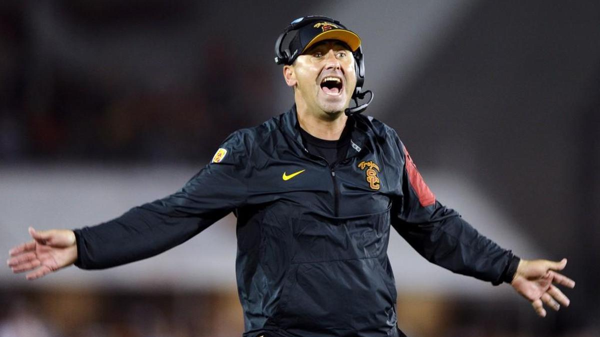 
Former UW coach Steve Sarkisian, now the coach of USC, yells at a referee during the fourth quarter of a 17-12 loss to the Huskies. Sarkisian exchanged hugs and cordial greetings with a few of his former players before and after the game.
