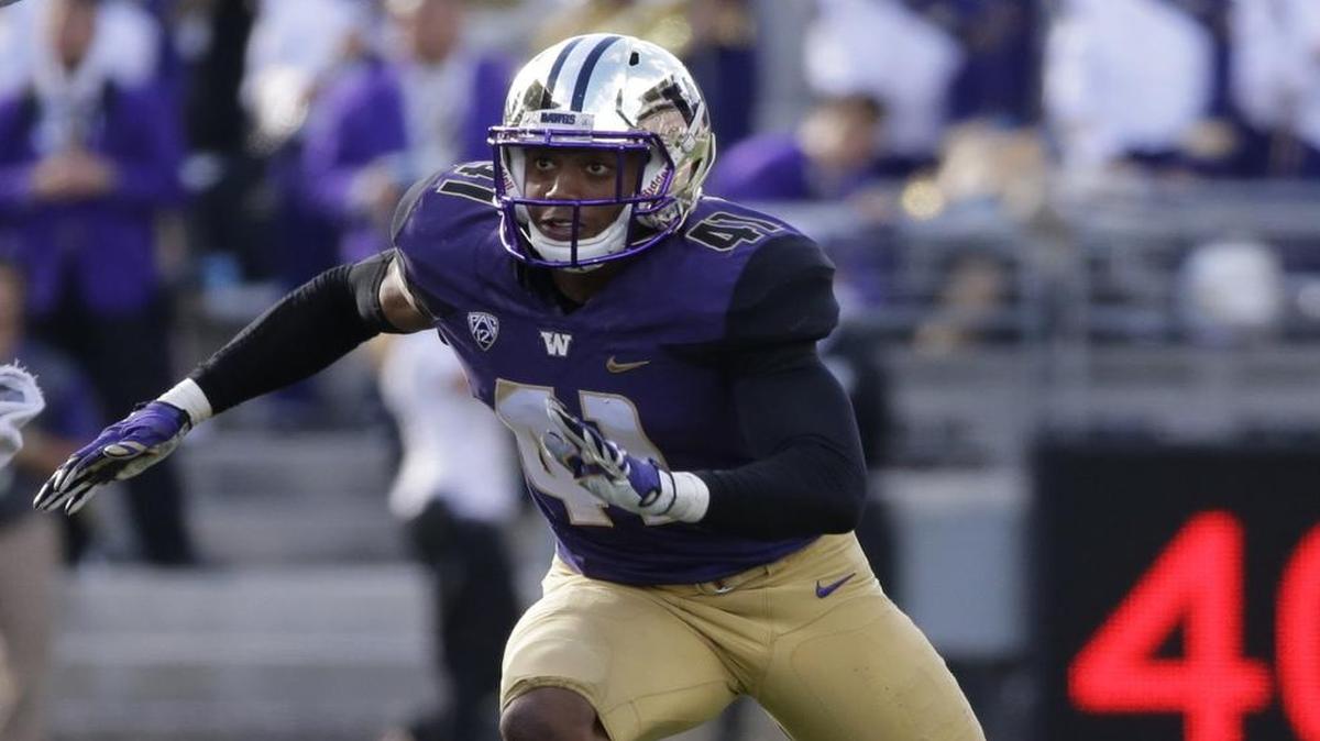 Washington's Travis Feeney runs during an NCAA college football game against Utah State, Saturday, Sept. 19, 2015, in Seattle.