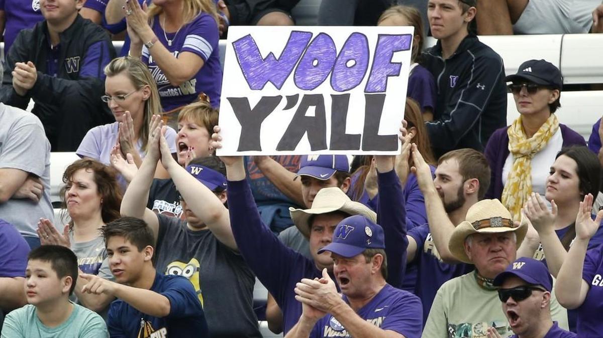 Washington fans cheer for their team against Southern Mississippi at the Heart of Dallas Bowl.
